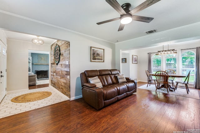 3618 Minthill, San Antonio, TX 78230 - living area featuring wood-type flooring, ornamental molding, ceiling fan, and baseboards