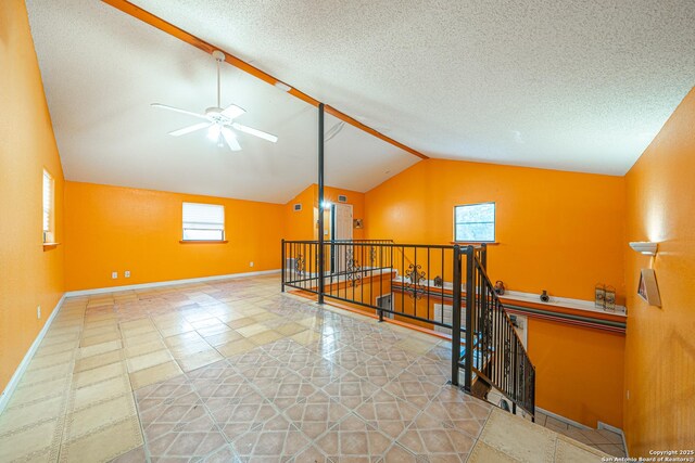 3211 Hatton, San Antonio, TX 78237 - corridor featuring an upstairs landing, lofted ceiling, baseboards, and tile patterned flooring