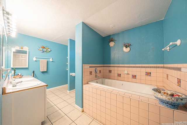 3211 Hatton, San Antonio, TX 78237 - full bath featuring a garden tub, tile patterned floors, double vanity, baseboards, and a textured ceiling