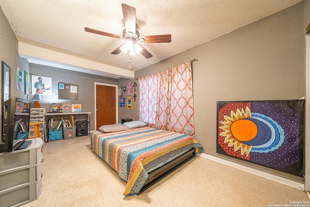3211 Hatton, San Antonio, TX 78237 - bedroom featuring a textured ceiling, ceiling fan, and tile patterned floors