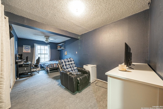 3211 Hatton, San Antonio, TX 78237 - carpeted bedroom featuring a desk, a textured ceiling, a textured wall, and ceiling fan