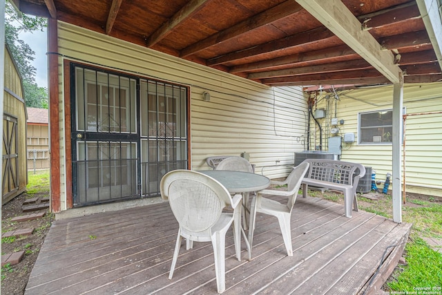 3211 Hatton, San Antonio, TX 78237 - wooden deck featuring outdoor dining space