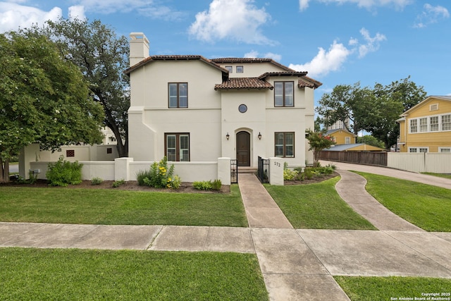 172 Katherine Ct Unit 1, San Antonio, TX 78209 - mediterranean / spanish house featuring a chimney, stucco siding, and a tile roof