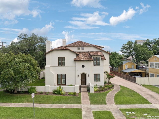 172 Katherine Ct Unit 1, San Antonio, TX 78209 - mediterranean / spanish house with a chimney, a gate, stucco siding, and a tiled roof