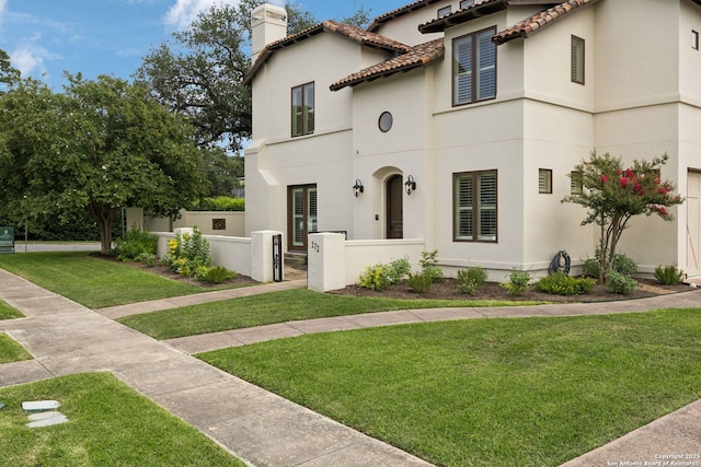 172 Katherine Ct Unit 1, San Antonio, TX 78209 - mediterranean / spanish house with a chimney, a tiled roof, stucco siding, and a front lawn