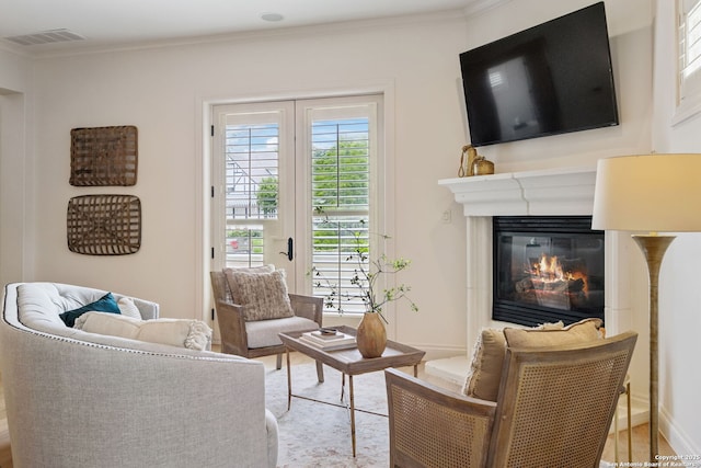 172 Katherine Ct Unit 1, San Antonio, TX 78209 - living area with a glass covered fireplace and crown molding