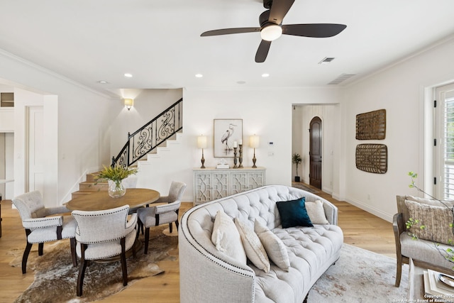 172 Katherine Ct Unit 1, San Antonio, TX 78209 - living area featuring a ceiling fan, light wood-type flooring, stairs, ornamental molding, and baseboards