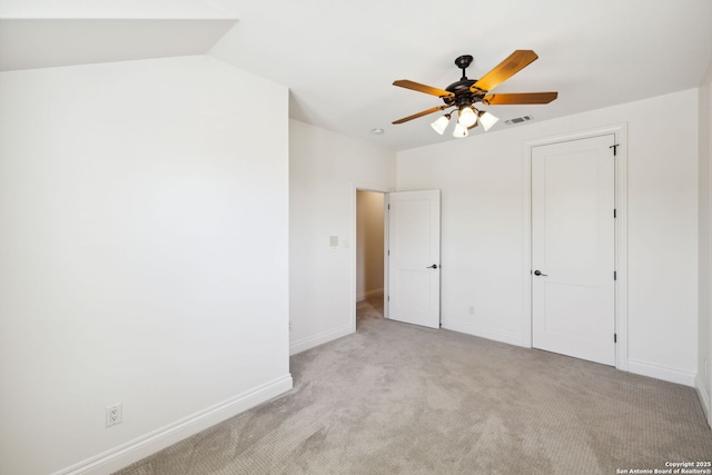 172 Katherine Ct Unit 1, San Antonio, TX 78209 - unfurnished bedroom featuring light carpet, baseboards, and a ceiling fan