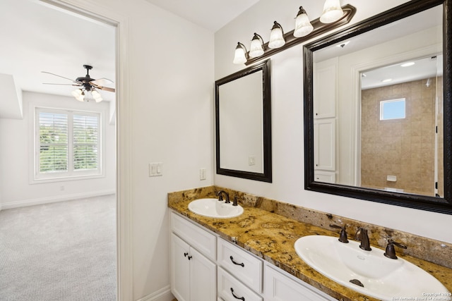 172 Katherine Ct Unit 1, San Antonio, TX 78209 - full bath with double vanity, baseboards, and ceiling fan