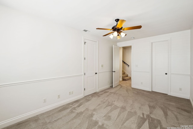 172 Katherine Ct Unit 1, San Antonio, TX 78209 - unfurnished bedroom with carpet floors, baseboards, and ceiling fan