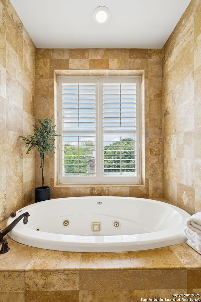 172 Katherine Ct Unit 1, San Antonio, TX 78209 - bathroom featuring plenty of natural light and a tub with jets