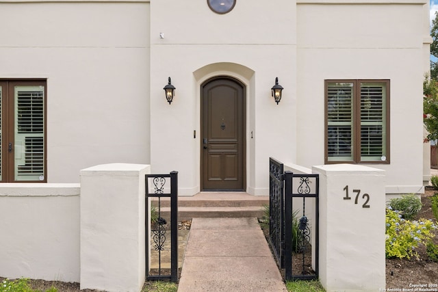 172 Katherine Ct Unit 1, San Antonio, TX 78209 - entrance to property featuring stucco siding and a gate