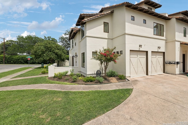 172 Katherine Ct Unit 1, San Antonio, TX 78209 - view of side of home with an attached garage, stucco siding, concrete driveway, and a lawn