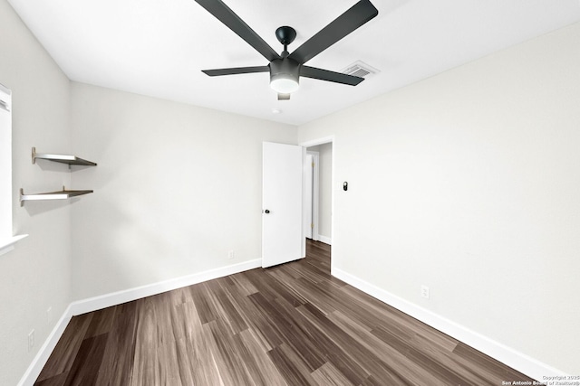 15831 Colton Wl, San Antonio, TX 78247 - empty room featuring dark wood finished floors, ceiling fan, and baseboards