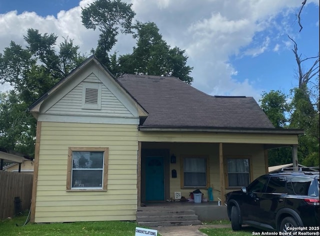 1202 Pine, Orange, TX 77630 - view of front facade featuring covered porch and roof with shingles