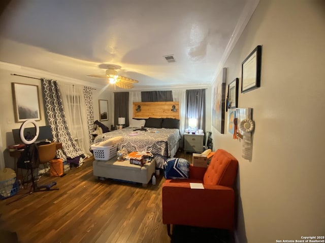 1202 Pine, Orange, TX 77630 - bedroom featuring ornamental molding, dark wood-style flooring, and ceiling fan