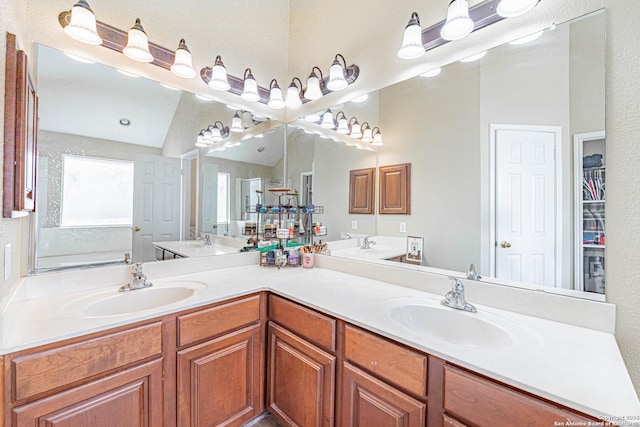 132 Las Palomas Ln, Vernia, TX 78121 - bathroom with double vanity and a walk in closet