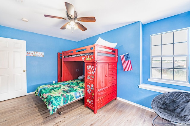 132 Las Palomas Ln, Vernia, TX 78121 - bedroom featuring wood finished floors, baseboards, and ceiling fan