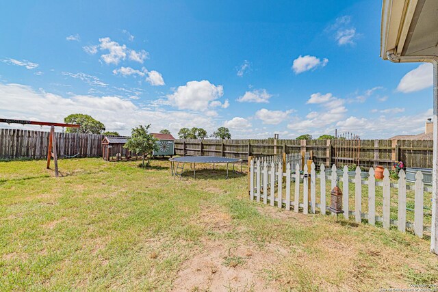 132 Las Palomas Ln, Vernia, TX 78121 - view of yard with a trampoline