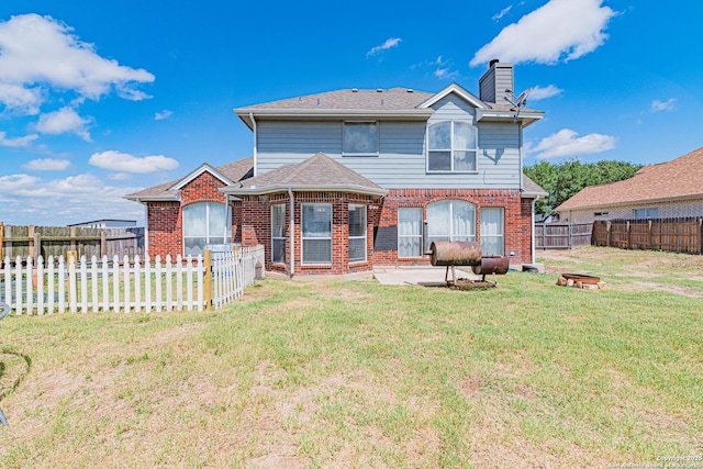 132 Las Palomas Ln, Vernia, TX 78121 - rear view of house with brick siding, a patio area, a chimney, and roof with shingles