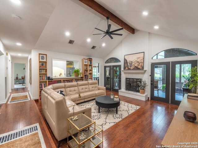120 Spanish Oak Trl, Floresville, TX 78114 - living area with hardwood / wood-style flooring, french doors, beamed ceiling, high vaulted ceiling, and ceiling fan