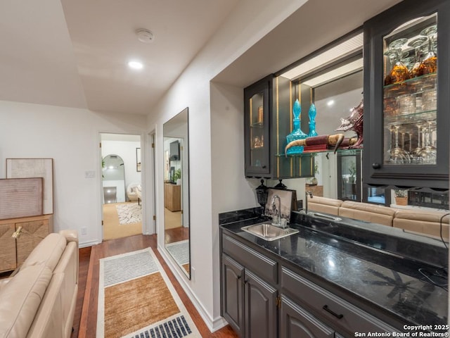 120 Spanish Oak Trl, Floresville, TX 78114 - indoor wet bar featuring wood finished floors and baseboards