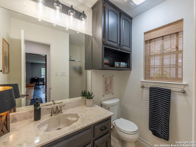 120 Spanish Oak Trl, Floresville, TX 78114 - bathroom featuring toilet and vanity