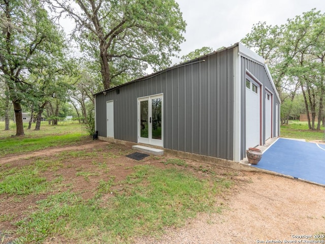 120 Spanish Oak Trl, Floresville, TX 78114 - view of outbuilding featuring french doors