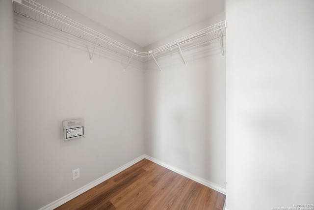 11907 Creek Peak, San Antonio, TX 78253 - walk in closet featuring wood finished floors