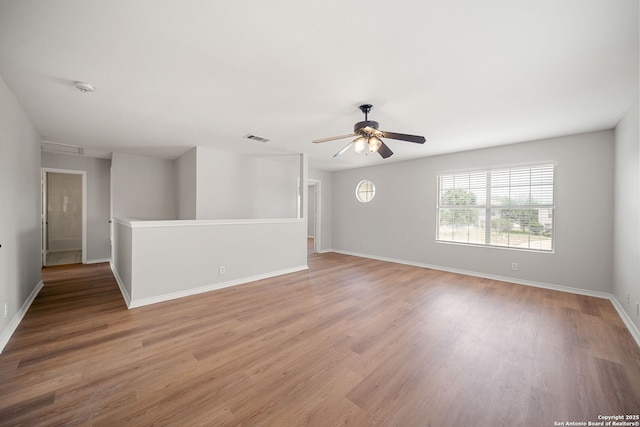 11907 Creek Peak, San Antonio, TX 78253 - spare room with ceiling fan, baseboards, and light wood-style floors