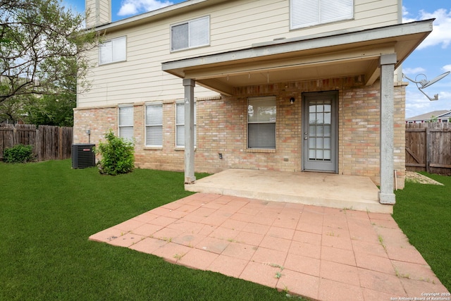 11907 Creek Peak, San Antonio, TX 78253 - back of house with a patio, brick siding, a chimney, and cooling unit