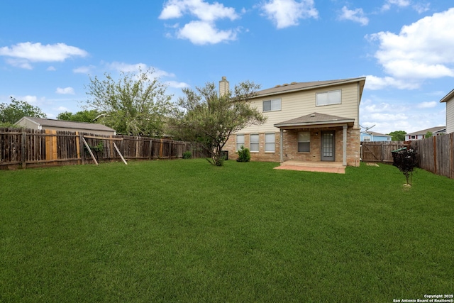 11907 Creek Peak, San Antonio, TX 78253 - back of property featuring a patio, a chimney, and brick siding