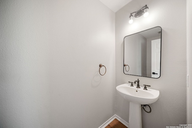 11907 Creek Peak, San Antonio, TX 78253 - bathroom featuring baseboards and wood finished floors