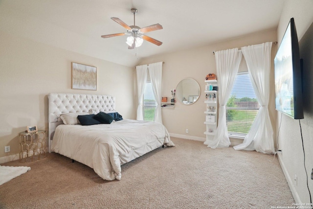 7027 Laura Hts, Schertz, TX 78154 - bedroom featuring baseboards, multiple windows, and carpet floors