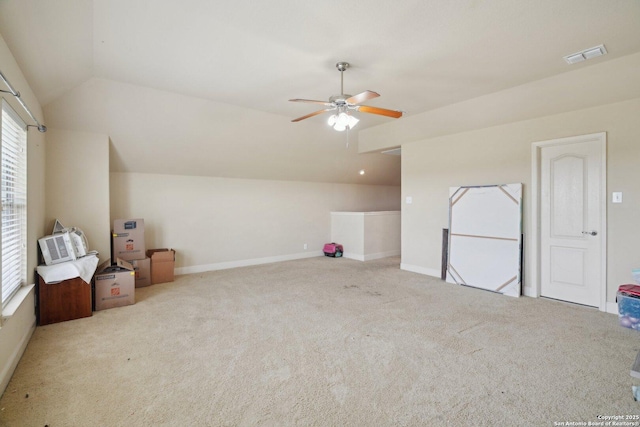 7027 Laura Hts, Schertz, TX 78154 - additional living space with lofted ceiling, ceiling fan, carpet flooring, healthy amount of natural light, and baseboards