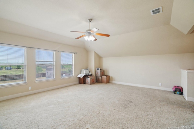 7027 Laura Hts, Schertz, TX 78154 - additional living space with lofted ceiling, ceiling fan, carpet floors, and baseboards
