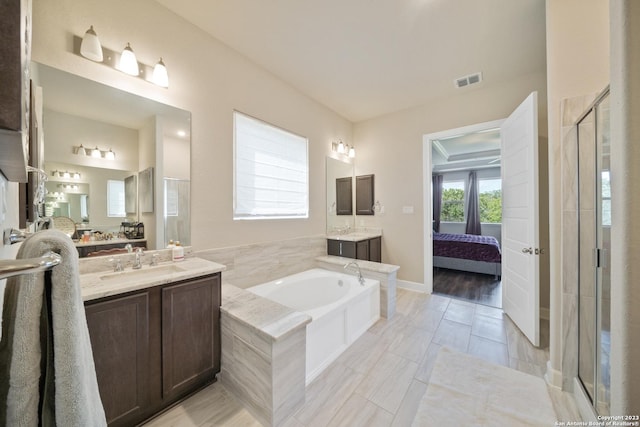 418 Sundance Way, San Antonio, TX 78253 - full bathroom with ensuite bathroom, a stall shower, a garden tub, and vanity