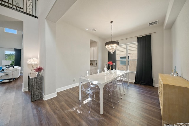 418 Sundance Way, San Antonio, TX 78253 - dining space featuring a chandelier, dark wood finished floors, and baseboards