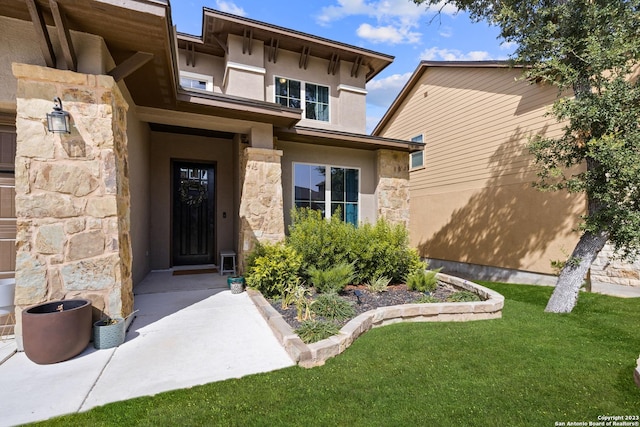 418 Sundance Way, San Antonio, TX 78253 - entrance to property featuring stone siding, stucco siding, and a lawn