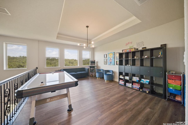 418 Sundance Way, San Antonio, TX 78253 - recreation room with a raised ceiling, wood finished floors, and a chandelier