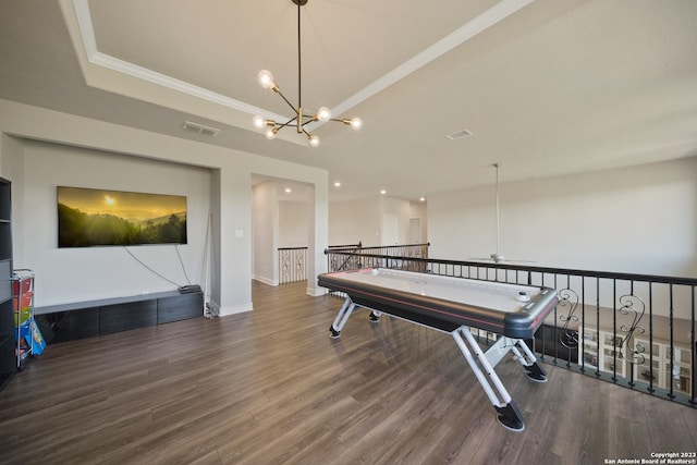 418 Sundance Way, San Antonio, TX 78253 - playroom with wood finished floors, a chandelier, crown molding, a ceiling fan, and a raised ceiling