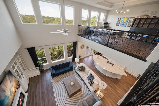 418 Sundance Way, San Antonio, TX 78253 - living room featuring wood finished floors, a ceiling fan, and a towering ceiling
