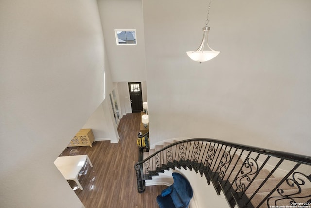 418 Sundance Way, San Antonio, TX 78253 - stairway featuring wood finished floors and a towering ceiling