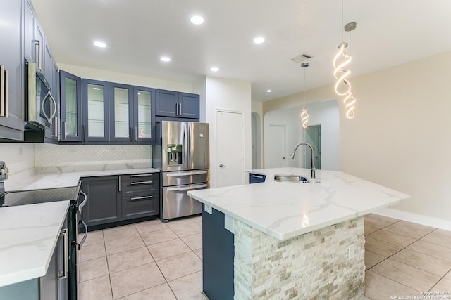 6601 Shadden Oaks, Live Oak, TX 78233 - kitchen featuring appliances with stainless steel finishes, a sink, light tile patterned floors, backsplash, and recessed lighting