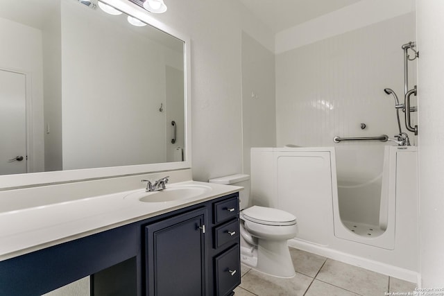 6601 Shadden Oaks, Live Oak, TX 78233 - bathroom featuring tile patterned flooring, toilet, vanity, and a tub