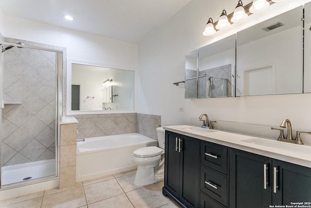 6601 Shadden Oaks, Live Oak, TX 78233 - bathroom with tile patterned flooring, a stall shower, double vanity, toilet, and a bath