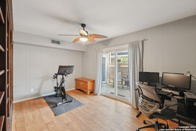107-A Ruelle Unit 107-A, San Antonio, TX 78209 - office featuring wood finished floors, ceiling fan, baseboards, and a decorative wall
