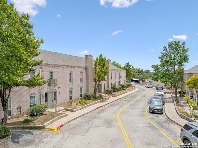 107-A Ruelle Unit 107-A, San Antonio, TX 78209 - view of asphalt street featuring curbs and sidewalks