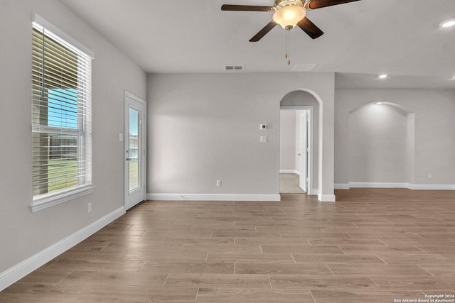 6538 Scooby Acres, San Antonio, TX 78108 - empty room featuring arched walkways, a ceiling fan, light wood finished floors, baseboards, and recessed lighting