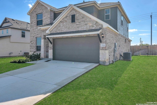 6538 Scooby Acres, San Antonio, TX 78108 - view of front facade featuring concrete driveway, stone siding, and central AC